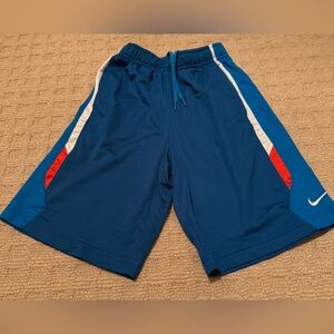 Nike dry fit athletic shorts blue with white and red accents in size small